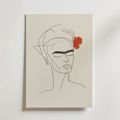 Bozetto Frida Inspired Line Art Poster föreställer ett minimalistiskt kvinnoansikte med slutna ögon, tjocka ögonbryn och en röd blomma, tryckt på premiumpapper och placerad på en vertikal, något upphöjd canvas.