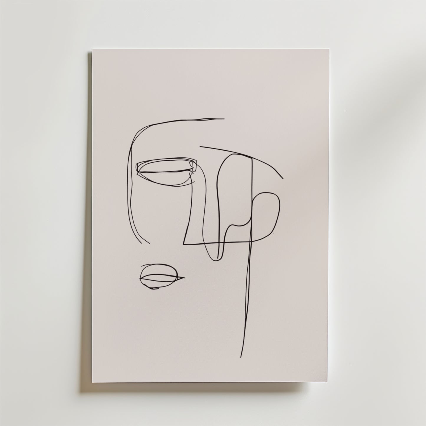 Bozetto Abstract One Line Face Poster visar ett minimalistiskt människoansikte i svarta linjer på premiumpapper med matt finish, mot en ljus bakgrund.