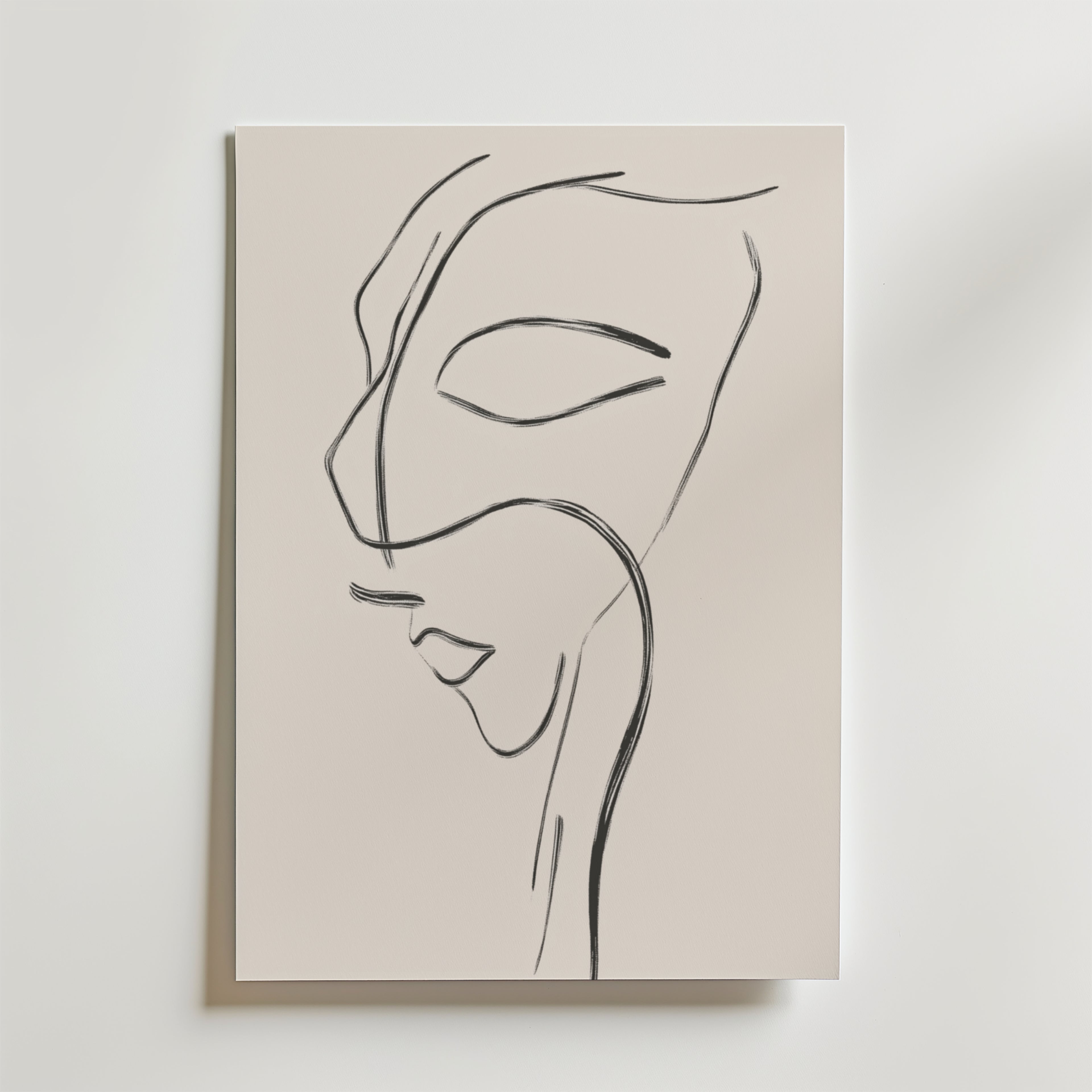 Förhöj ditt rum med Elegant Line Art Face Poster från Bozetto. Med en kvinnas profil i enkla svarta linjer på premiumpapper ger detta minimalistiska konstverk en raffinerad, modern touch till alla heminredning.