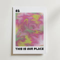 This Is Our Place Poster av Bozetto har djärva, abstrakta virvlar i rosa, gult och grönt, med "03" längst upp till vänster och "THIS IS OUR PLACE" längst ner - ett slående, känslomässigt motiv som passar perfekt för alla utrymmen.