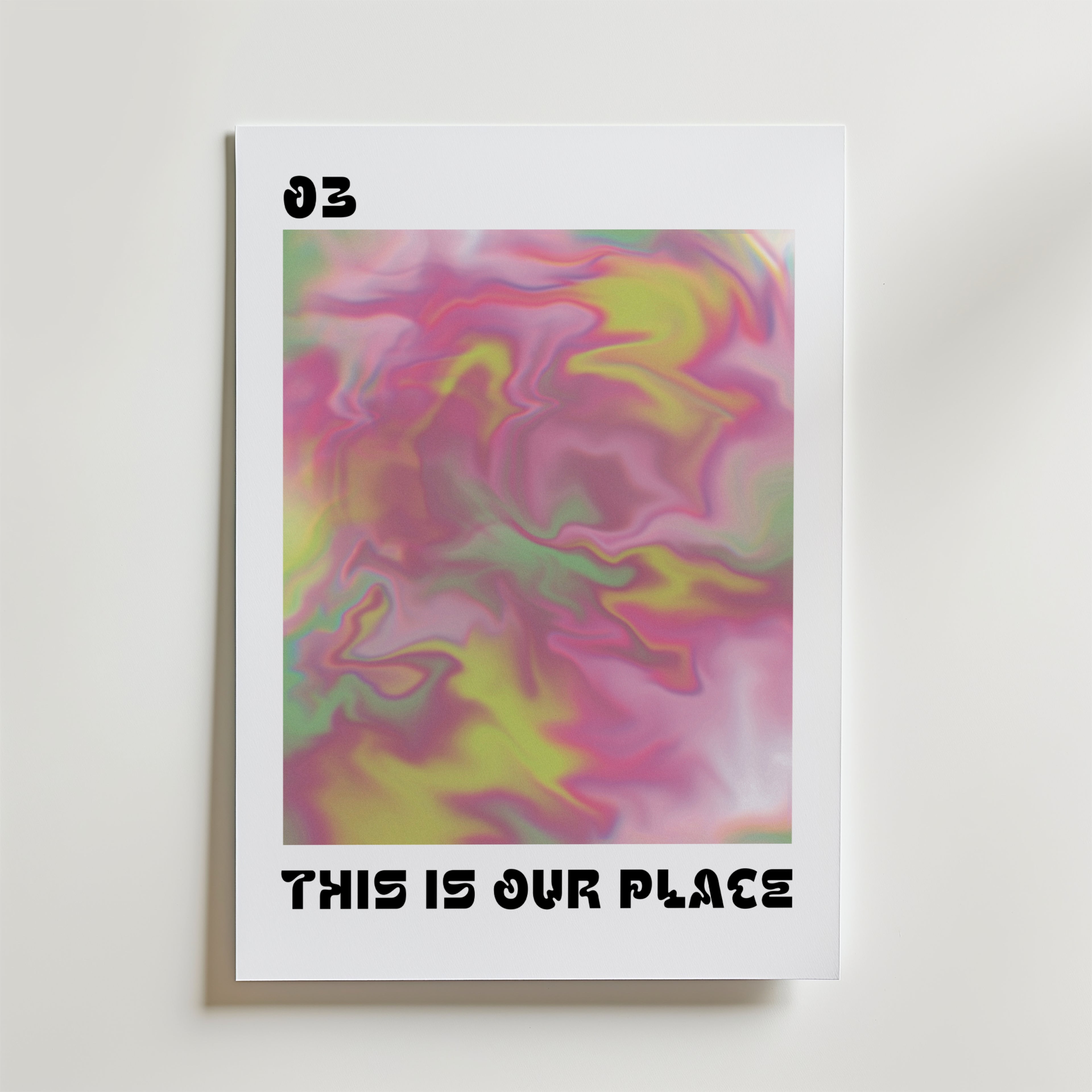 This Is Our Place Poster av Bozetto har djärva, abstrakta virvlar i rosa, gult och grönt, med "03" längst upp till vänster och "THIS IS OUR PLACE" längst ner - ett slående, känslomässigt motiv som passar perfekt för alla utrymmen.