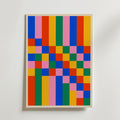 Bozetto Bauhaus Color Grid Poster är en inramad poster med abstrakta modernistiska rektanglar i livfulla färger som blått, rött, orange, gult, grönt och rosa, arrangerade i ett rutmönster - perfekt för färgglad inredning.