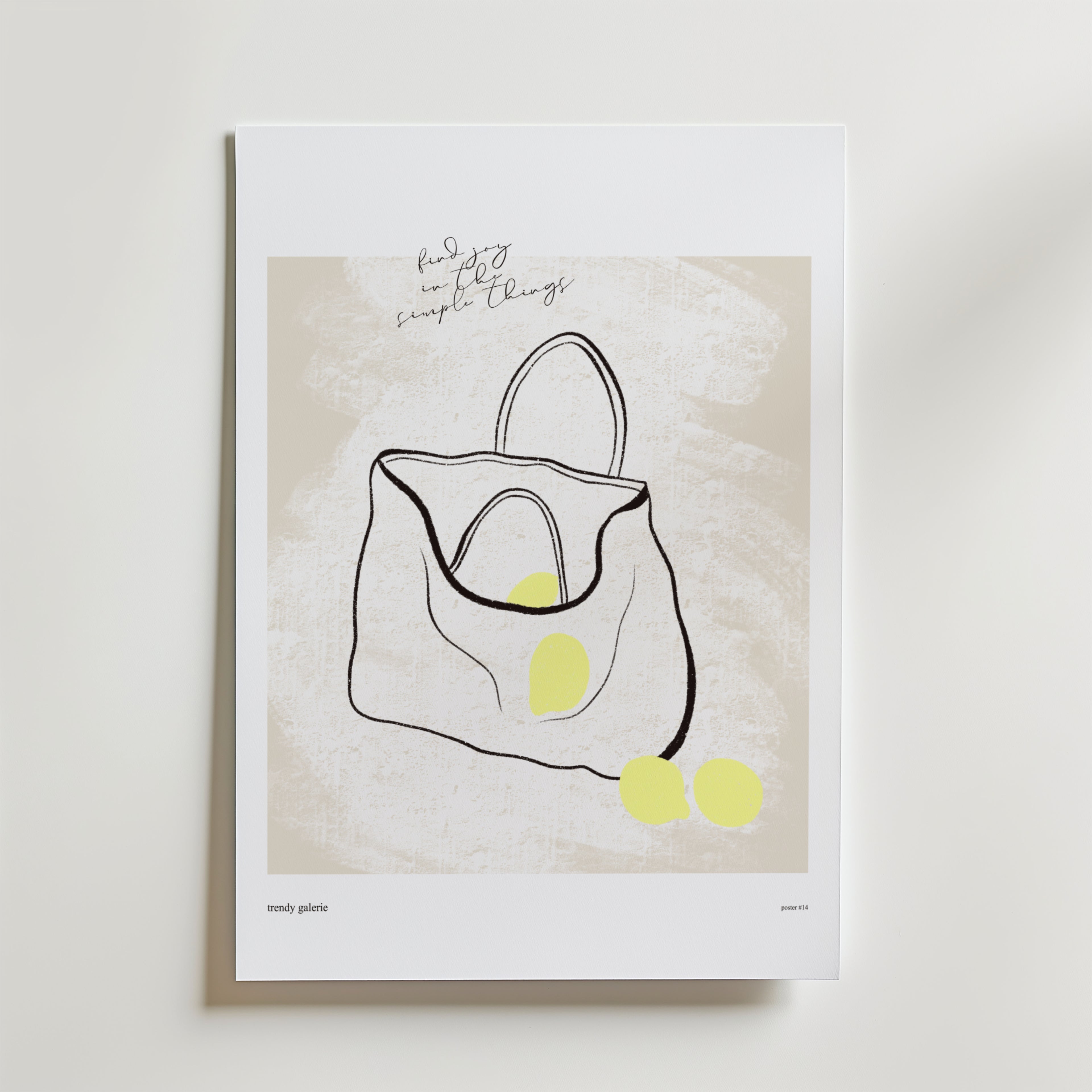 Everyday Ritual Poster by Bozetto visar en minimalistisk linjeteckning av en öppen tygväska med gula ovaler och handskriven text: "find joy in the simple things-celebrating vardagens ritualer och hemmets estetik.